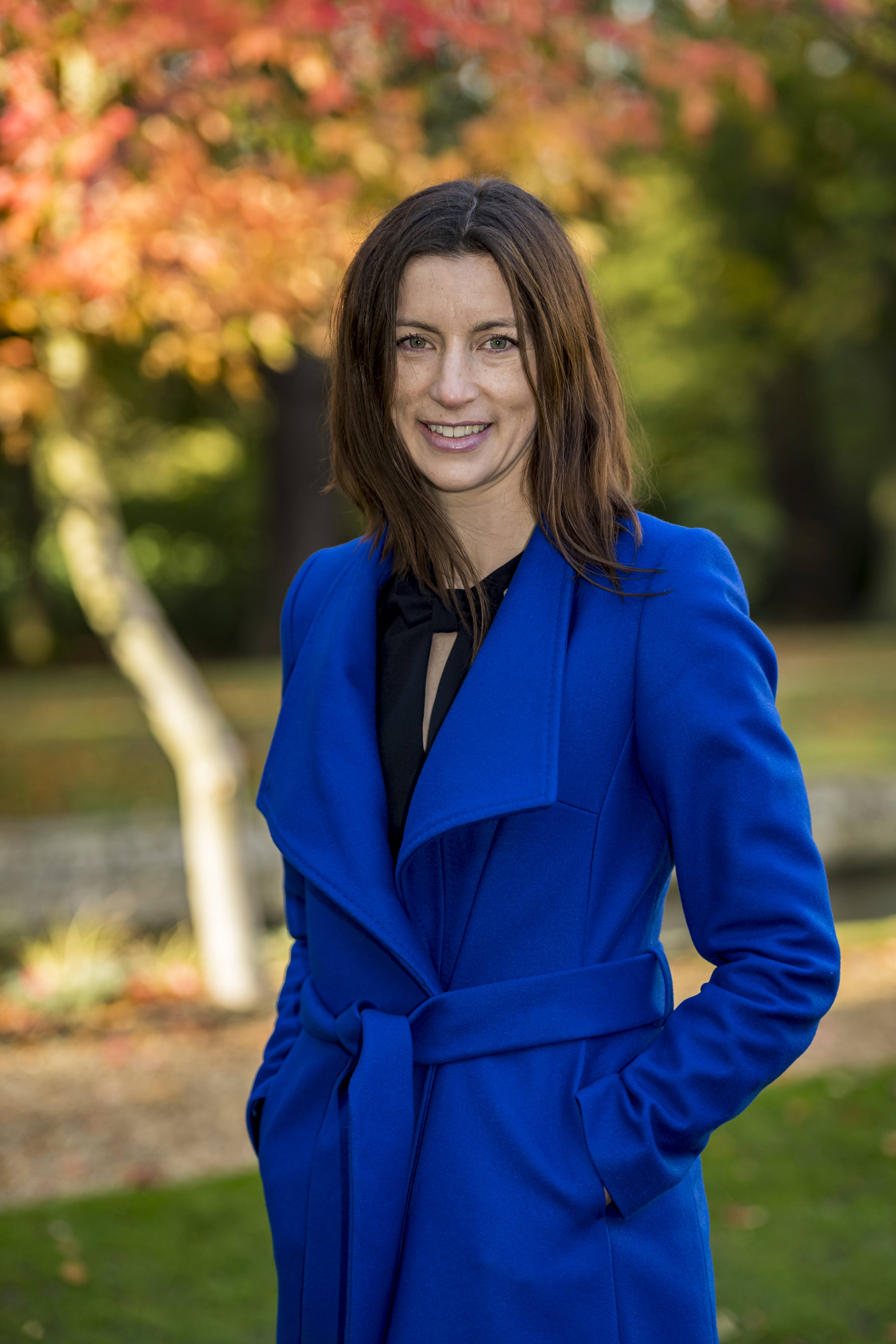 Dr Kristen MacAskill in a blue jacket, outdoors.