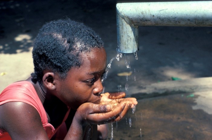 WASH image of child drinking water